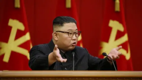 EPA/KCNA A photo released by North Korea's official KCNA news agency shows North Korean leader Kim Jong-un at a meeting of the Workers Party in Pyongyang. Photo: 18 June 2021