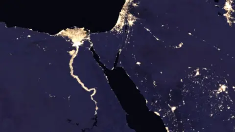 NASA Composite image of Nile River and surrounding region at night in 2016 (c) NASA Earth Observatory images by Joshua Stevens, using Suomi NPP VIIRS data from Miguel Román, NASA's Goddard Space Flight Center