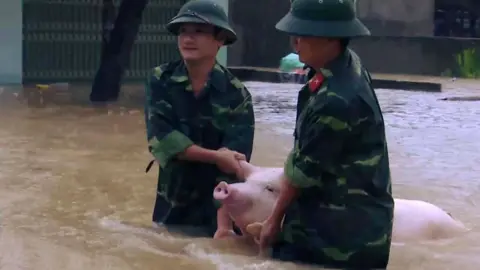 Vietnam flash floods and landslides kill dozens