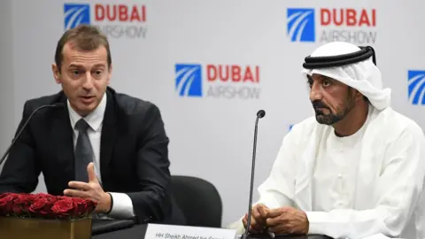 AFP Airbus chief executive Guillaume Faury and Emirates chairman Ahmed bin Saeed Al Maktoum