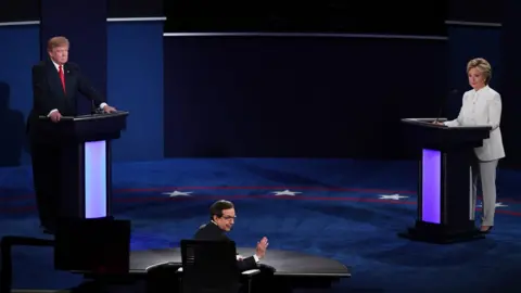 Getty Images Moderator Chris Wallace speaks to the audience during the third presidential debate between Donald Trump and Hillary Clinton in 2016