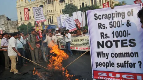 Getty Images Protest in city of Kolkata against withdrawal of bank notes