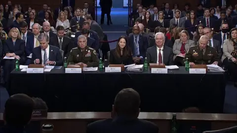 US security officials sit before Senate Intelligence Committee