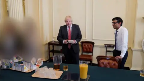 Sue Gray Report/Cabinet Office Boris Johnson and Rishi Sunak at a gathering in Downing Street for the PM's birthday