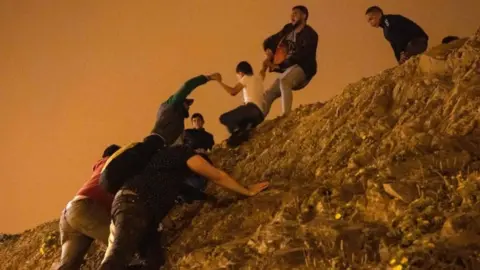 Migrants crossing illegally into Ceuta, 18 May 21