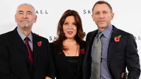 Getty Images Michael G Wilson and Barbara Broccoli with Daniel Craig