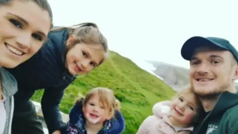 Family photo Lee Collins with his partner Rachel and three children
