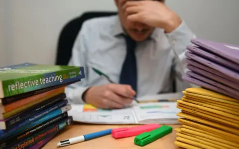 Getty Images Teacher studying