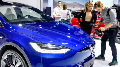 Getty Images A Tesla car on display in Brussels