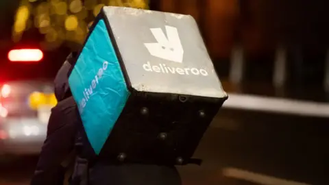 Getty Images Deliveroo rider at night