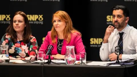 PA Media Kate Forbes, Ash Regan and Humza Yousaf taking part in SNP leadership hustings at Eden Court, Inverness