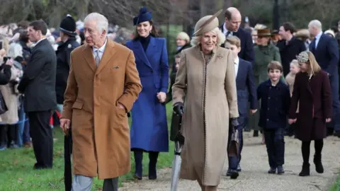Reuters King Charles, the Queen and the Princess of Wales