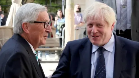Reuters Jean-Claude Juncker and Boris Johnson