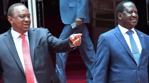 AFP Kenya"s President Uhuru Kenyatta (left) gestures as National Super Alliance (NASA) coalition opposition leader Raila Odinga looks on