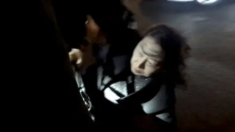 Reuters Teresa Cheng pictured falling in London