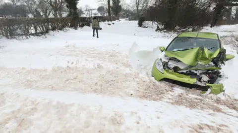 PA A damaged car in Belah Bridge, near Brough