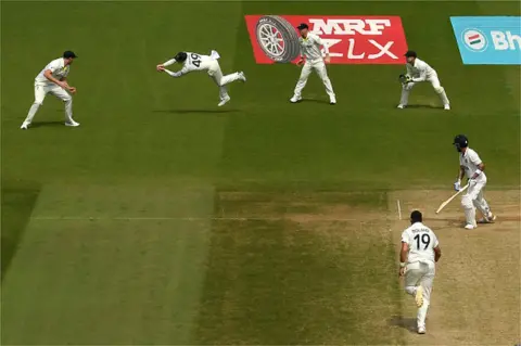 Getty Images Steven Smith of Australia takes the catch to dismiss Virat Kohli of India during day five of the ICC World Test Championship Final between Australia and India at The Oval on June 11, 2023 in London, England.