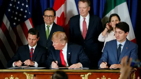 Reuters US President Donald Trump, Mexico President Enrique Pena Nieto and Canada Prime Minister Justin Trudeau attend USMCA signing ceremony