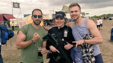 Leicester City Police Fans with armed officer