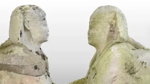 Mander Auctioneers Egyptian Sphinx garden statues