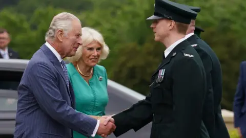 PA Media King Charles and Queen Camilla arrive at Hillsborough Castle, County Down