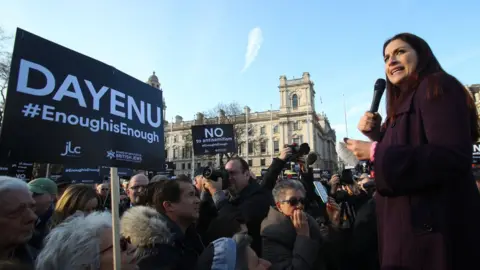 PA Luciana Berger talking to protesters in London