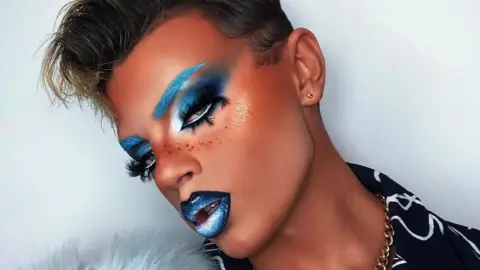 Wezley Webber Wezley Webber with bright blue makeup look