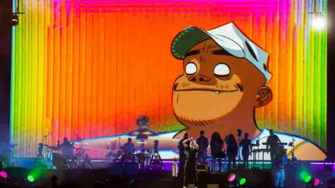 Getty Images The band Gorillaz on stage