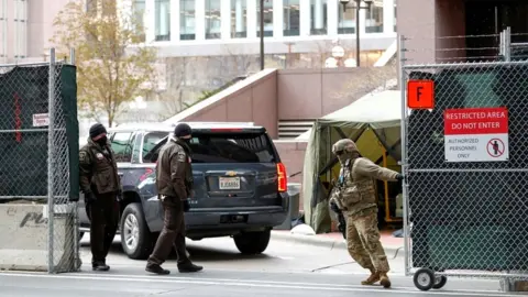 Reuters Hennepin County Sheriff Deputies and the US Army National Guard help secure the Hennepin County Government Center during closing arguments for former Minneapolis Police officer Derek Chauvin"s murder trial at the Hennepin County Government Center, in Minneapolis, US, on 19 April 2021