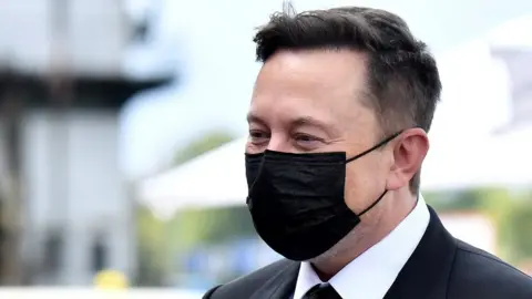 Reuters Elon Musk wears a mask as he arrives in Berlin, Germany, on 2 September 2020
