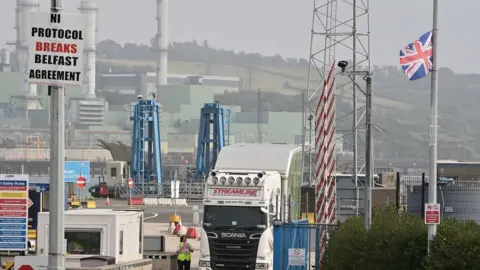 Charles McQuillan An anti-Irish sea border poster at Larne harbour