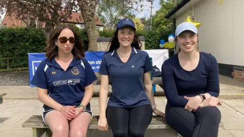 BBC Three female cricketers at the unveiling of the changing rooms