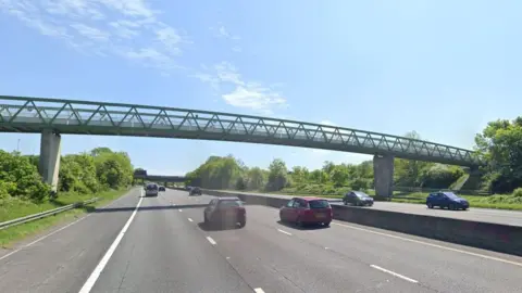 Google Bridge over southbound carriageway at junction 36 of M1