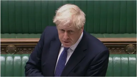 PA Media Boris Johnson at PMQs on 21 October