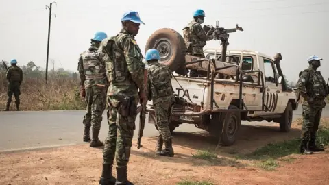 Getty Images Rwandan UN peacekeepers at check-points on the road from Bangui to Damara, on January 23, 2021