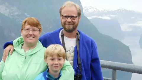 Prof Linda Kah Prof Kah and husband Colin and their son Douglas