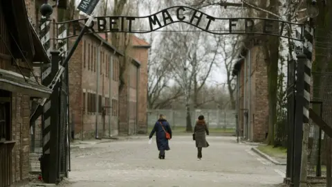 PA The gates at Auschwitz I camp, with the infamous inscription "Arbeit Macht Frei" - work will set you free