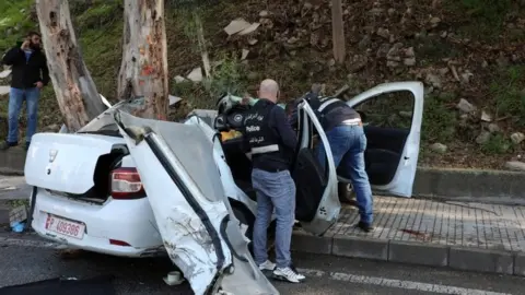 Reuters Aftermath of the car crash