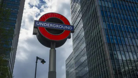 An underground sign is seen ahead of the strike of underground workers, 1 April 2024