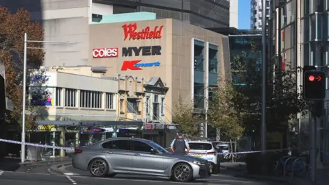 Getty Images Police cordon off surrounding areas at Westfield Bondi Junction after the attack on 13 April