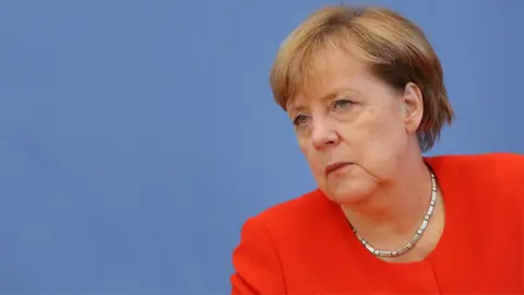 Getty Images Image shows German chancellor Angel Merkel