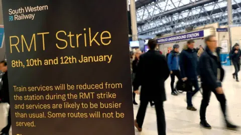 Neil Hall RMT strike sign