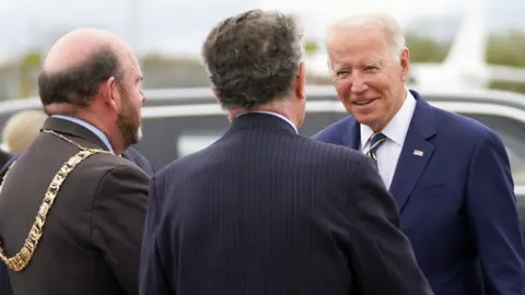 Reuters President Joe Biden is greeted upon arrival in Edinburgh