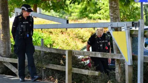 SWNS Police investigate outside Home Bargains