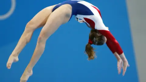 AFP USA athlete on the beam at one of the Olympic Games