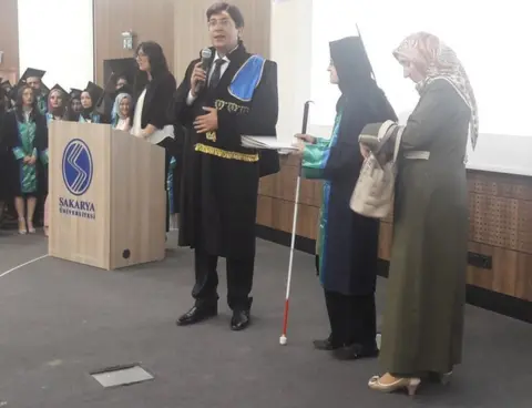 Sakarya University Sakarya University Law Faculty's Dean Mahmut Bilen, Berru Merve Kul and her mother Havva Kul