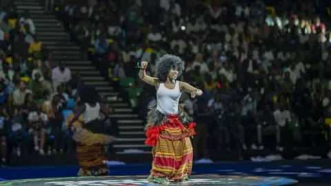 Getty Images A woman dancing at the opening ceremony of the Giants of Africa Festival in Kigali, Rwanda - Sunday 13 August 2023