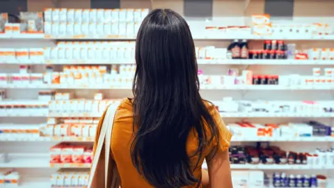 Getty Images Woman shopping