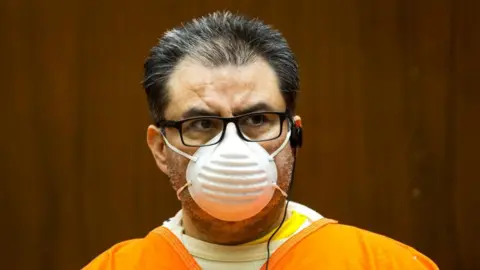 Getty Images Naasón Joaquín García, the leader of the Guadalajara-based La Luz del Mundo church, at his bail hearing held at Clara Shortridge Foltz Criminal Justice Center on Wednesday, Aug. 5, 2020 in Los Angeles