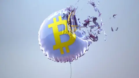 Getty Images Illustration of Bitcoin balloon bursting